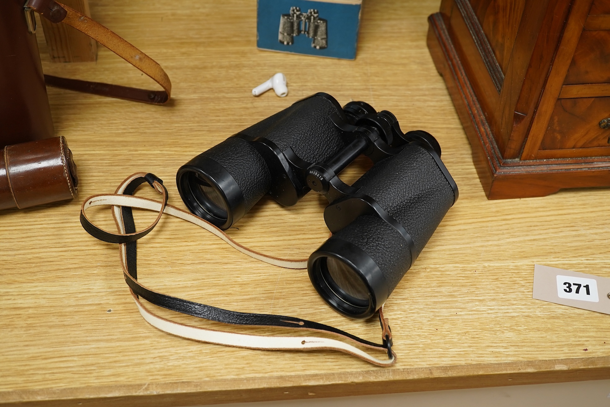 A leather cased telescope, a Zeiss Ikon camera and cased Zeiss Decarem 10 x 50 binoculars- 20cm high plus original box, 20cm high